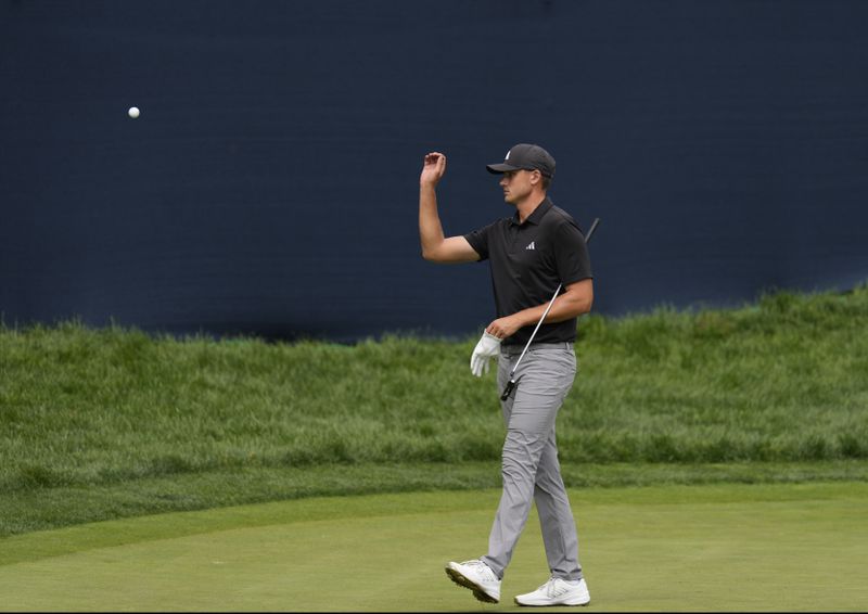 Ludvig Aberg, of Sweden, heads off the 16th green during the second round of the BMW Championship golf event at Castle Pines Golf Club, Friday, Aug. 23, 2024, in Castle Rock, Colo. (AP Photo/Matt York)