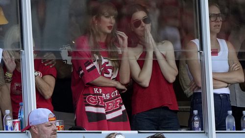 Taylor Swift is seen in a suite during the first half of an NFL football game between the Kansas City Chiefs and the Cincinnati Bengals Sunday, Sept. 15, 2024, in Kansas City, Mo. (AP Photo/Charlie Riedel)