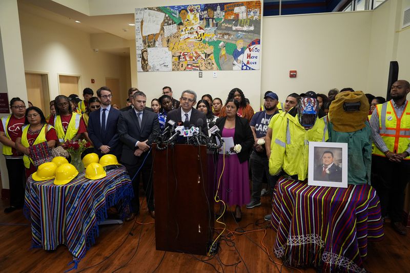 Gustavo Torres, executive director of advocacy organization CASA, speaks during a press conference among relatives of Miguel Luna, a worker who died during the collapse of Baltimore's Francis Scott Key Bridge, Tuesday, Sept. 17, 2024, in Baltimore. (AP Photo/Stephanie Scarbrough)