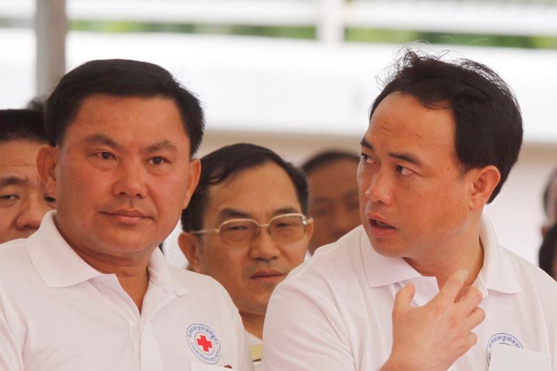 FILE - Cambodian business tycoons, Ly Yong Phat, front left, takes part in ceremonies held ahead of the World Red Cross Day in Phnom Penh, Cambodia, Tuesday, May 3, 2011. (AP Photo/Heng Sinith)