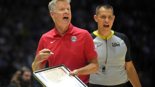 United States' head coach Steve Kerr gestures to his players during an exhibition basketball game between the United States and South Sudan, at the o2 Arena in London, Saturday, July 20, 2024. (AP Photo/Kin Cheung)