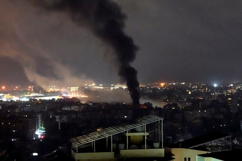 Smoke rises from Israeli airstrikes in Beirut's southern suburbs, Lebanon, Saturday, Sept. 28, 2024. (AP Photo/Hassan Ammar)