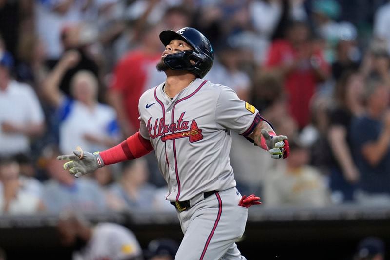 Atlanta Braves' Orlando Arcia celebrates after hitting a two-run home run during the fifth inning of a baseball game against the San Diego Padres, Friday, July 12, 2024, in San Diego. (AP Photo/Gregory Bull)