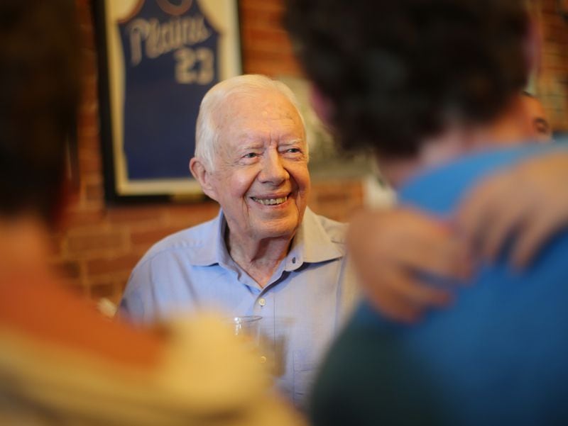 President Jimmy Carter smiles while greeting friends, family and fans at a fund raiser and birthday party for his wife Rosalynn on Saturday evening August 22, 2015 in Plains. Ben Gray / bgray@ajc.com