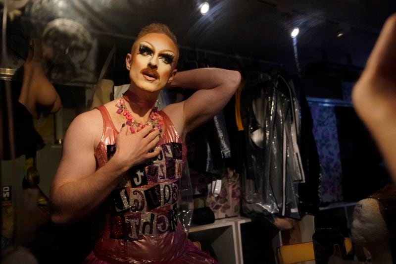 Pattie Gonia gets ready before performing in the "Save Her! Environmental Drag Show" during Climate Week, Tuesday, Sept. 24, 2024, in the Brooklyn borough of New York. (AP Photo/Alyssa Goodman)