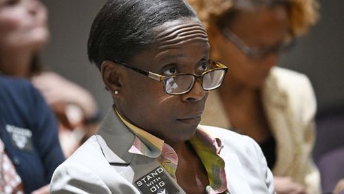 Inspector General Shannon Manigault sits among other attendees during the first meeting of a task force established to review her office's authority at Atlanta City Hall, on Tuesday, Sept. 24, 2024. (Hyosub Shin / AJC)