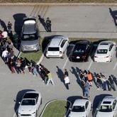 On Wednesday, Feb. 14, 2018, Nikolas Cruz opened fire in Marjory Stoneman Douglas High School, killing 17 people. The school resource officer on campus stayed outside the entire time. He was the only person on-site with a firearm and did not stop Cruz, says a University of Georgia student. (Mike Stocker/Sun Sentinel/TNS)