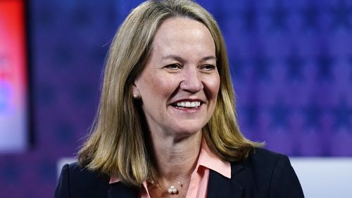 FILE - Kris Mayes smiles before a debate on Sept. 28, 2022, in Phoenix. (AP Photo/Ross D. Franklin, File)