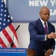 NYC Mayor Eric Adams gets a refill of NYC tap water while speaking to reporters at a news conference about repairs occurring to the water supply infrastructure in New York, Monday, Sept. 30, 2024. (AP Photo/Seth Wenig)