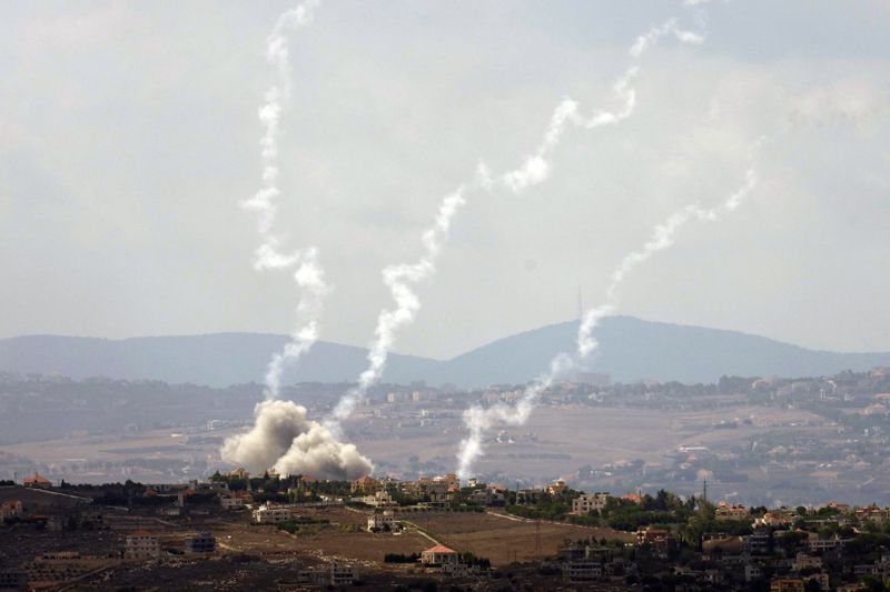 Smoke rises from Israeli airstrikes on Taybeh village, seen from the southern town of Marjayoun, Lebanon, Monday, Sept. 23, 2024. (AP Photo/Hussein Malla)