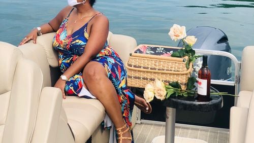 Candis Harris was one of nine guests on a mid-July boat ride on Lake Lanier. Party organizer Daniele Mays said guests were asked to wear masks during the gathering, even though it was outside. Mays, an event planner, said COVID-19 rules have drastically changed the way she operates her business.