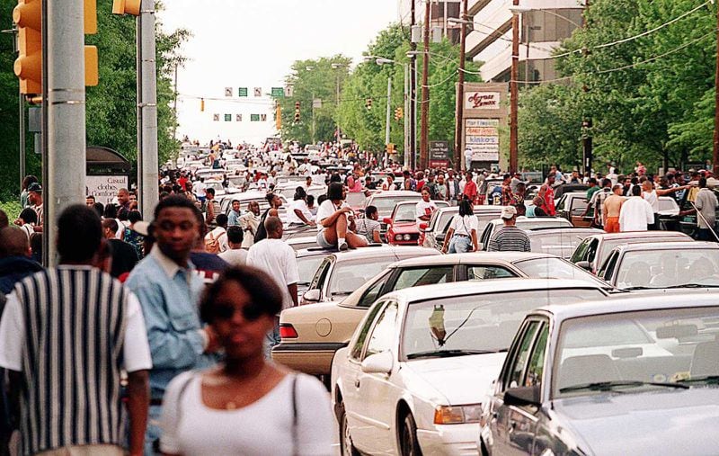 Freaknik revelers bring Atlanta traffic to a standstill after Lenox Square and Phipps Plaza malls closed early on a Saturday in 1995. (John Spink/The Atlanta Journal-Constitution/TNS)