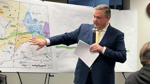 Greg Teague, the CEO of Croy Engineering, points to a map of the proposed Hanson Spur that the Sandersville Railroad Company is seeking to build, at a hearing at the Georgia Public Service Commission. (Drew Kann/The Atlanta Journal-Constitution/TNS)