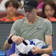 Italy's Jannick Sinner rests between sets against Roman Safiullin of Russia during the China Open tennis tournament held at the National Tennis Center in Beijing, Saturday, Sept. 28, 2024. (AP Photo/Ng Han Guan)