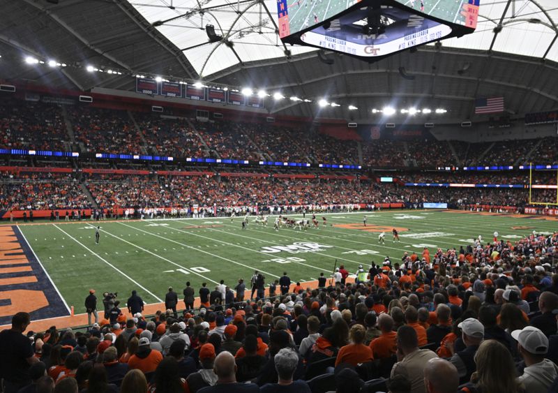 Fans watch Syracuse play Georgia Tech during the second half of an NCAA football game on Saturday, Sept. 7, 2024, in Syracuse, N.Y. Syracuse won 31-28. (AP Photo/Hans Pennink)