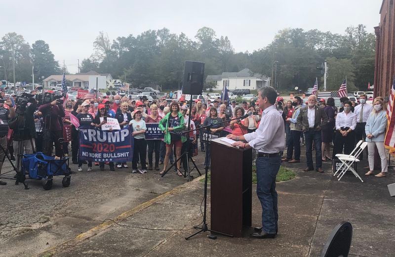 Gov. Brian Kemp speaks to a crowd of Republican supporters in Manchester, Ga. ahead of Joe Biden's visit to Georgia on Oct. 27, 2020.