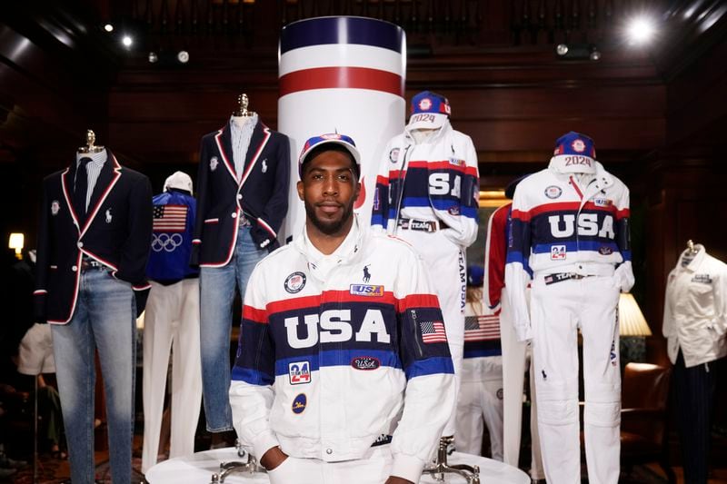 Olympic athlete Jamal Hill models the Team USA Paris Olympics closing ceremony uniform at Ralph Lauren headquarters on Monday, June 17, 2024, in New York. (Photo by Charles Sykes/Invision/AP)