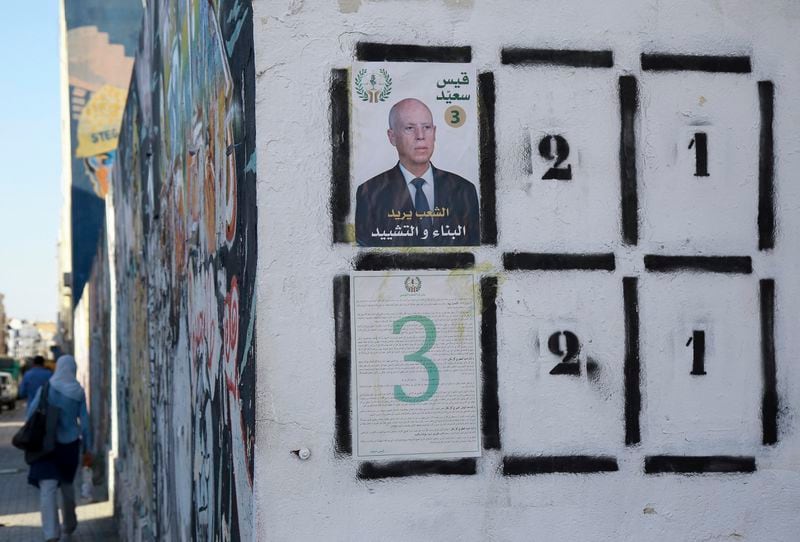 An election banner for Tunisian president and candidate for re-election Kais Saied pictured in Tunis ahead of the upcoming presidential elections, in Tunis, Tunisia, Thursday, Sept. 26, 2024. (AP Photo/Anis Mili)