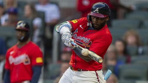 Atlanta Braves' Michael Harris II hits a line drive to center field in the third inning of a baseball game against the Washington Nationals, Friday, Aug. 23, 2024, in Atlanta. (AP Photo/Jason Allen)