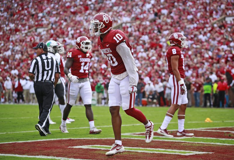 NORMAN, OK - SEPTEMBER 16: Defensive back Steven Parker #10 of the Oklahoma Sooners celebrates a defensive play in the end zone against the Tulane Green Wave at Gaylord Family Oklahoma Memorial Stadium on September 16, 2017 in Norman, Oklahoma. Oklahoma defeated Tulane 56-14. (Photo by Brett Deering/Getty Images)