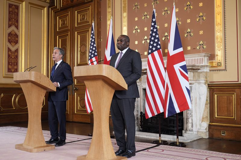 Secretary of State Antony Blinken, left speaks during a joint press conference with Britain's Foreign Secretary David Lammy in the Locarno room at the Foreign, Commonwealth and Development Office (FCDO) in London, Tuesday, Sept. 10, 2024. (AP Photo/Mark Schiefelbein, Pool)