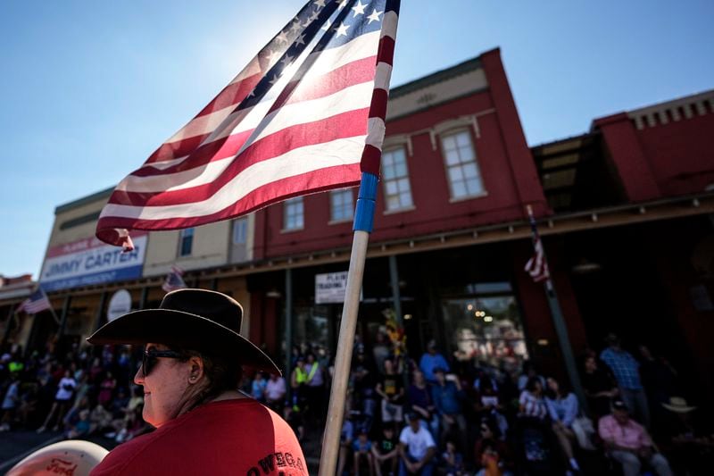 A float moves down main street during the 26th annual Plains Peanut Festival, ahead of former President Jimmy Carter's birthday on Oct. 1, Saturday, Sept. 28, 2024, in Plains, Ga. Carter didn't attend the festival. (AP Photo/Mike Stewart)