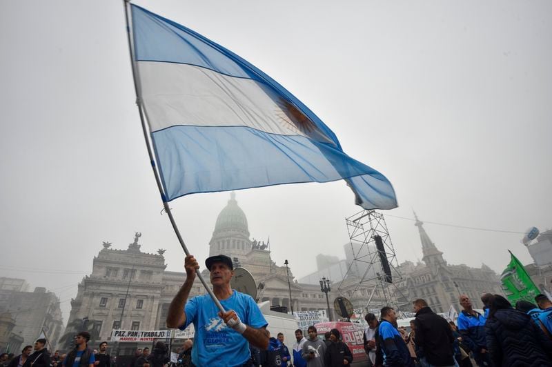 Anti-government protesters gather outside Congress where lawmakers debate a reform bill promoted by Argentine President Javier Milei in Buenos Aires, Argentina, Wednesday, June 12, 2024. (AP Photo/Gustavo Garello)