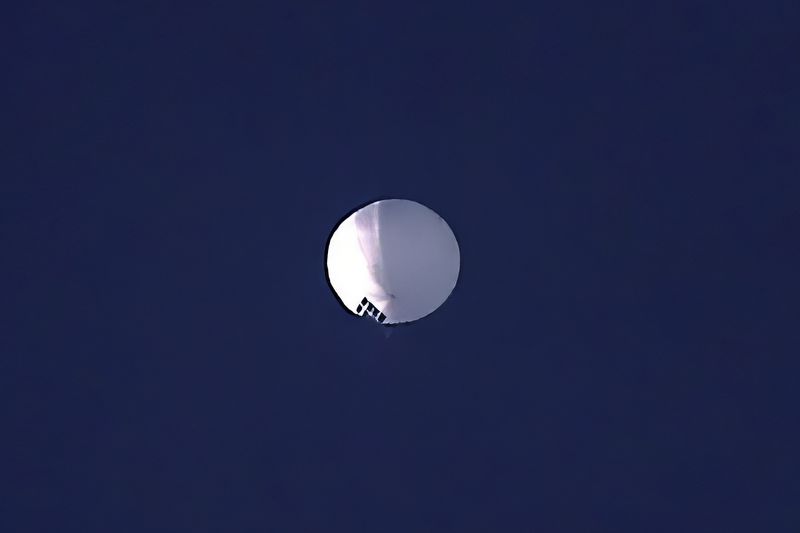 FILE - A high altitude Chinese spy balloon floats over Billings, Mont., Feb. 1, 2023. (Larry Mayer/The Billings Gazette via AP, File)