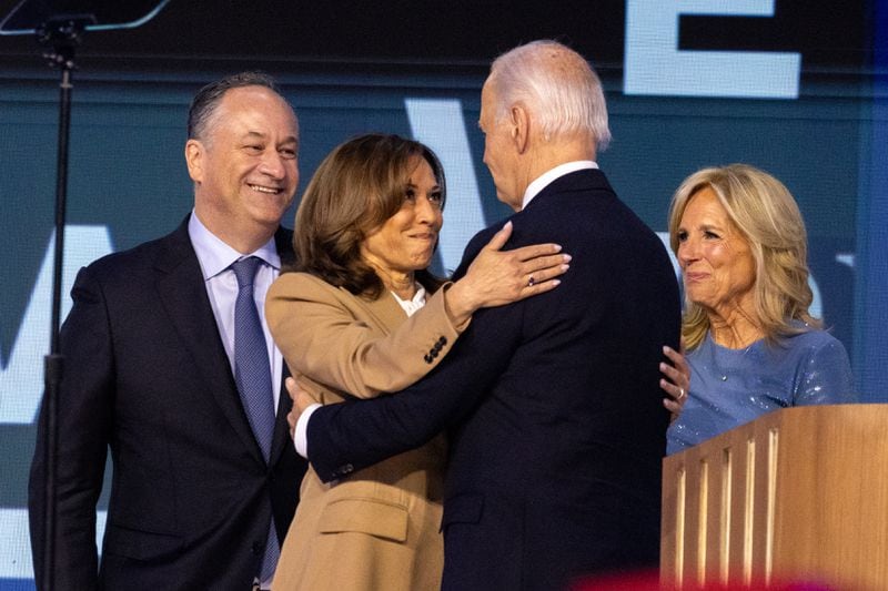 Presidential nominee Kamala Harris and President Joe Biden embrace on the first day of the Democratic National Convention. The two have combined for about a dozen stops in metro Atlanta over the current presidential campaign. (Arvin Temkar / AJC)