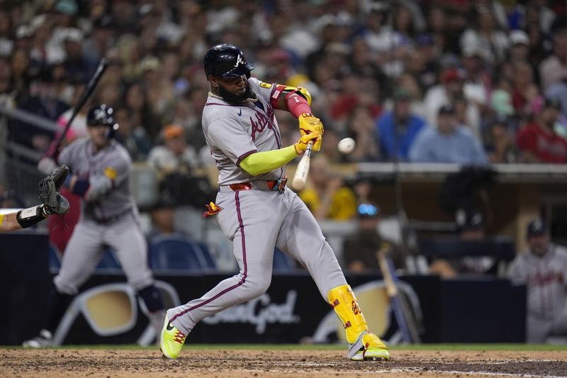 Atlanta Braves' Marcell Ozuna hits a home run during the ninth inning of a baseball game against the San Diego Padres, Friday, July 12, 2024, in San Diego. (AP Photo/Gregory Bull)