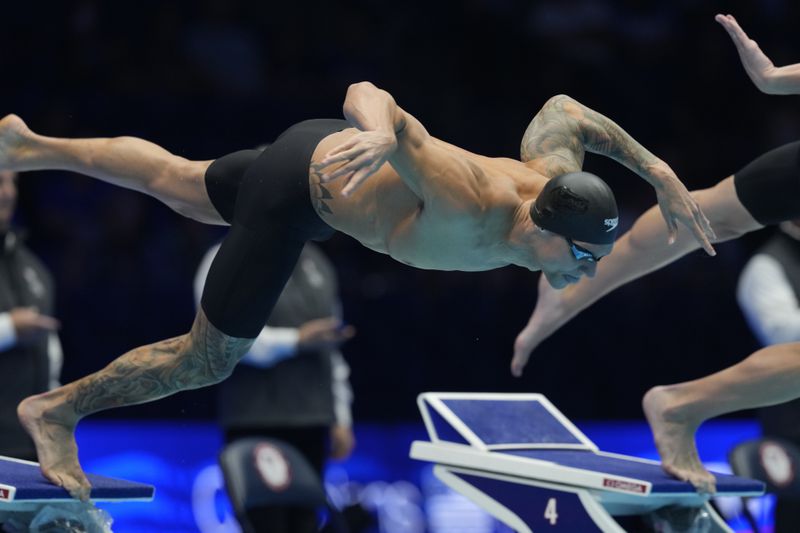 Caeleb Dressel swims during a Men's 100 freestyle semifinals heat Tuesday, June 18, 2024, at the US Swimming Olympic Trials in Indianapolis. (AP Photo/Darron Cummings)