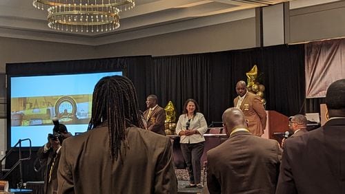 SBA Administrator Isabella Casillas Guzman (center) speaks at the 39th Biennial Conclave of the Iota Phi Theta, Inc. fraternity about the partnership between the U.S. Small Business Administration and the members of National Pan-Hellenic Council, the "Divine Nine."