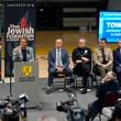 FILE - Los Angeles Mayor Karen Bass, at podium, addresses community members and other local, state law enforcement officials in a town hall on antisemitic violence at YULA Boys High School in Los Angeles Monday, Feb. 20, 2023. (AP Photo/Damian Dovarganes, File)