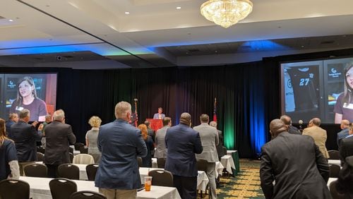 School superintendents from across Georgia applaud as Gov. Brian Kemp prepares to speak at their annual conference in Athens on Thursday, Oct. 17, 2019. Kemp reiterated a campaign pledge to raise teacher pay by $5,000. He and lawmakers gave them $3,000 this year, and Kemp said he would follow through with the rest without committing to a timeline. TY TAGAMI / AJC