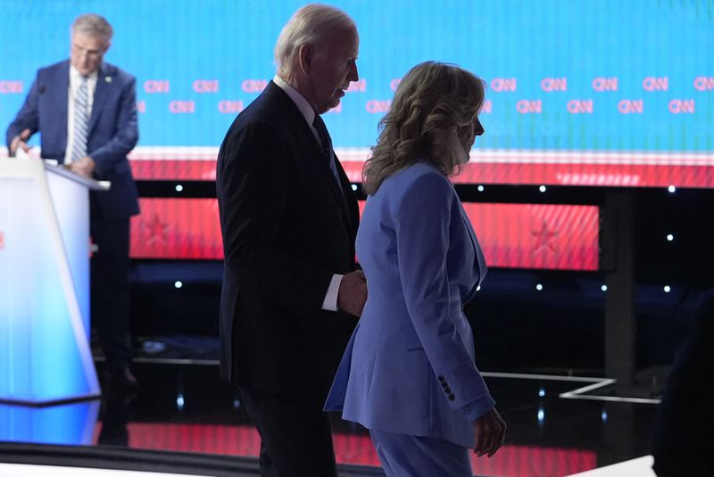 FILE - President Joe Biden, left, and first lady Jill Biden depart following a presidential debate with Republican presidential nominee former President Donald Trump hosted by CNN, Thursday, June 27, 2024, in Atlanta. (AP Photo/Gerald Herbert, File)