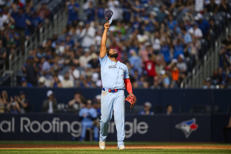 Toronto Blue Jays first baseman Vladimir Guerrero Jr. celebrates after a baseball game against the Los Angeles Angels in Toronto, Saturday, Aug. 24, 2024. (Christopher Katsarov/The Canadian Press via AP)