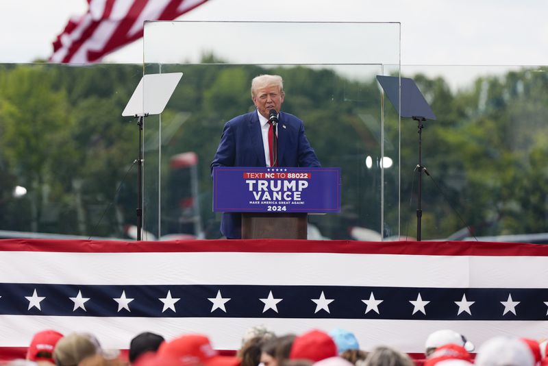 Republican presidential nominee former President Donald Trump speaks during a campaign rally at North Carolina Aviation Museum, Wednesday, Aug. 21, 2024, in Asheboro, N.C. (AP Photo/Julia Nikhinson)