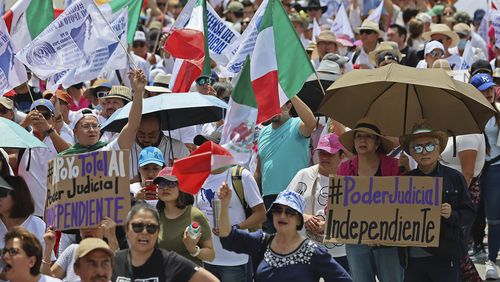 Federal court workers gather as they strike over reforms that would make all judges stand for election in Mexico City, Sunday, Aug. 25, 2024. (AP Photo/Ginnette Riquelme)