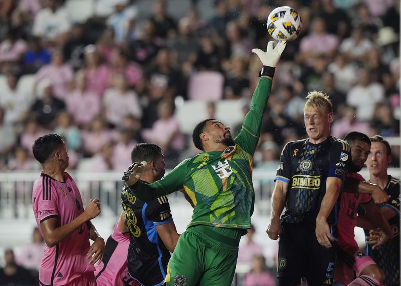 Inter Miami goalkeeper Drake Callender (1) deflects a corner kick during the first half of an MLS soccer match against the Philadelphia Union, Saturday, Sept. 14, 2024, in Fort Lauderdale, Fla. (AP Photo/Marta Lavandier)