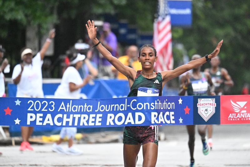 Fotyen Tesfay wins Elite Women’s division of the 54th running of the Atlanta Journal-Constitution Peachtree Road Race in Atlanta on Tuesday, July 4, 2023.   (Hyosub Shin / Hyosub.Shin@ajc.com)