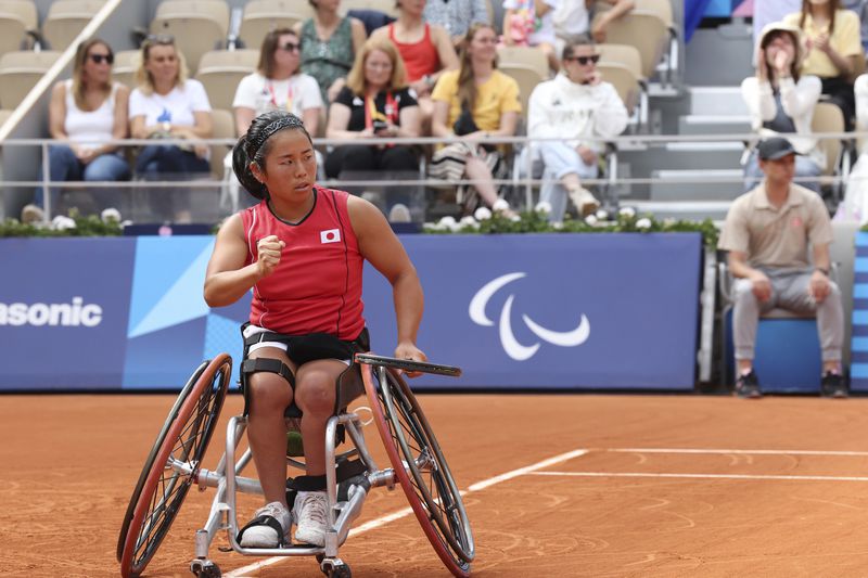 Japan's Yui Kamiji reacts after winning a point in the Women's Singles Wheelchair Tennis Gold Medal Match at the 2024 Paralympics, on Friday, Sept. 6, 2024 in Paris, France. (AP Photo/Caleb Craig)