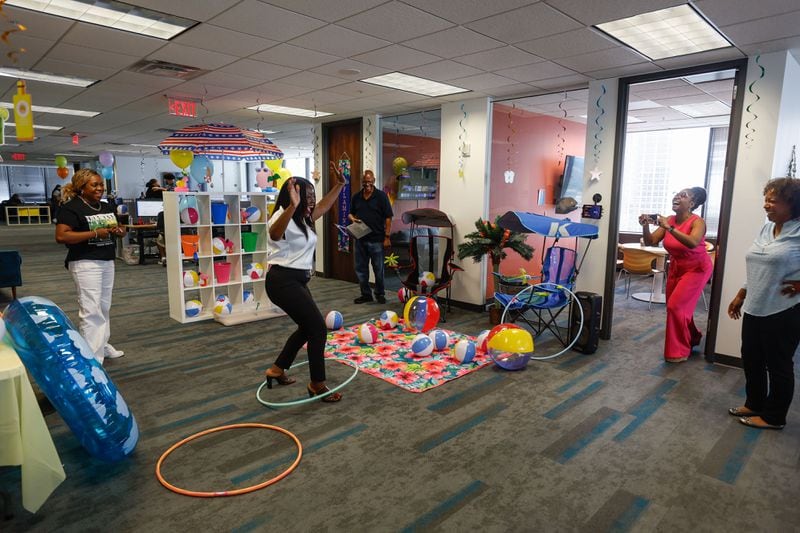 Employees have fun during a break at CallRail headquarters in Downtown Atlanta shown on Tuesday, July 9, 2024. (Natrice Miller/ AJC)