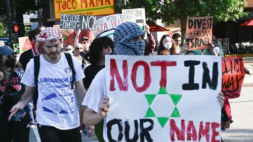 Protesters march through downtown Athens, Georgia on their way to City Hall during a pro-Palestinian demonstration on Aug. 22, 2024. (Photo Courtesy of Merrielle Gatlin/The Red & Black)