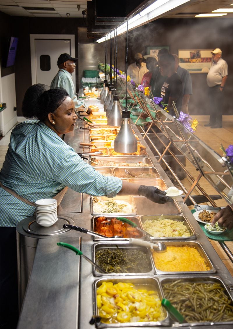 The servers at Magnolia Room remain cool and collected, even as the kitchen grows steamy. Martha Williams for The Atlanta Journal-Constitution