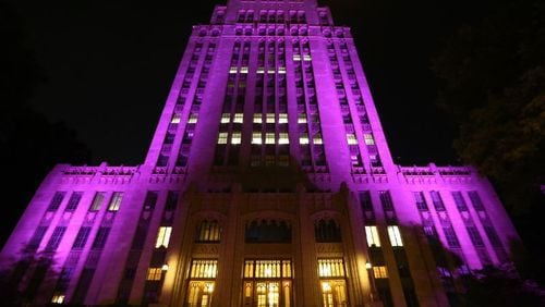 Atlanta City Hall is bathed in changing, colored lights Monday night, June 29, 2015 to celebrate the Supreme Court’s ruling on same-sex marriages. Ben Gray / bgray@ajc.com