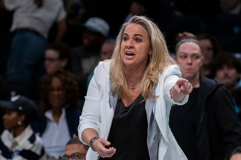 Las Vegas Aces head coach Becky Hammon reacts during the first half of a WNBA basketball second-round playoff game against the New York Liberty, Sunday, Sept. 29, 2024, in New York. (AP Photo/Corey Sipkin)