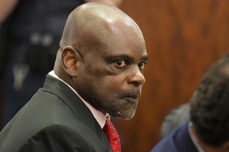 Retired Houston Police Department officer Gerald Goines looks on during the opening statement of his two felony murder charges in the January 2019 deaths of Dennis Tuttle and Rhogena Nicholas, Monday, Sept. 9, 2024, at Harris County Criminal Courthouse in Houston. (Yi-Chin Lee/Houston Chronicle via AP)