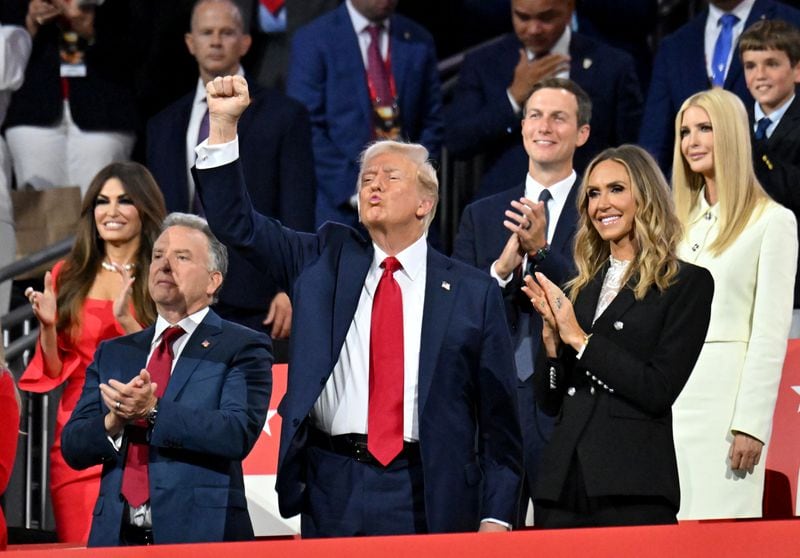 Calon presiden dari Partai Republik, mantan Presiden Donald Trump, bereaksi saat Hulk Hogan, penghibur dan pegulat profesional, berpidato pada hari terakhir Konvensi Nasional Partai Republik 2024, Kamis, 18 Juli 2024, di pusat kota Milwaukee, WI. (Hyosub Shin/AJC)