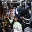 Travelers ride on the plane train on Friday, December 9, 2022, at Hartsfield Jackson International airport in Atlanta.CHRISTINA MATACOTTA FOR THE ATLANTA JOURNAL-CONSTITUTION.