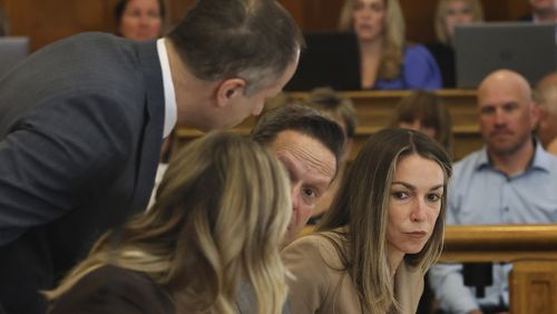 FILE - Karen Read sits at the defense table with her attorneys during her murder trail at Dedham Superior Court on May 14, 2024, in Dedham, Mass. (Nancy Lane/The Boston Herald via AP, Pool, file)